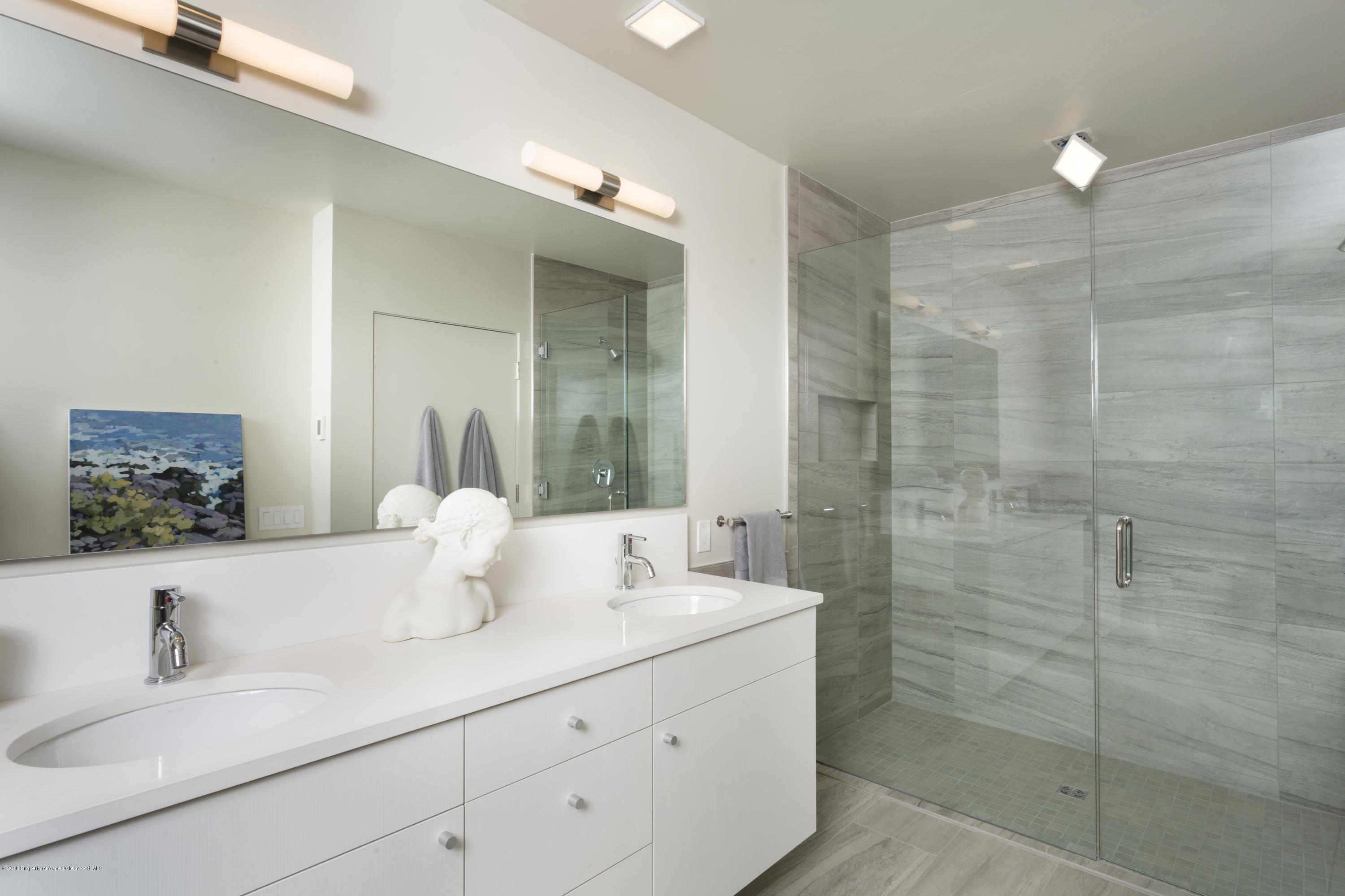100 Evans Road, Unit 104 Basalt, CO 81621 - Photo 14 of 24 a bathroom with a sink and a mirror