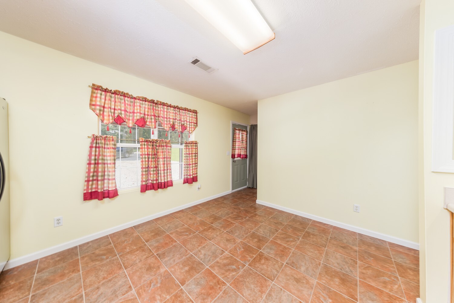 415 French Hill Road Tennessee Ridge, TN 37178 - Photo 12 of 48 a view of an empty room with a window
