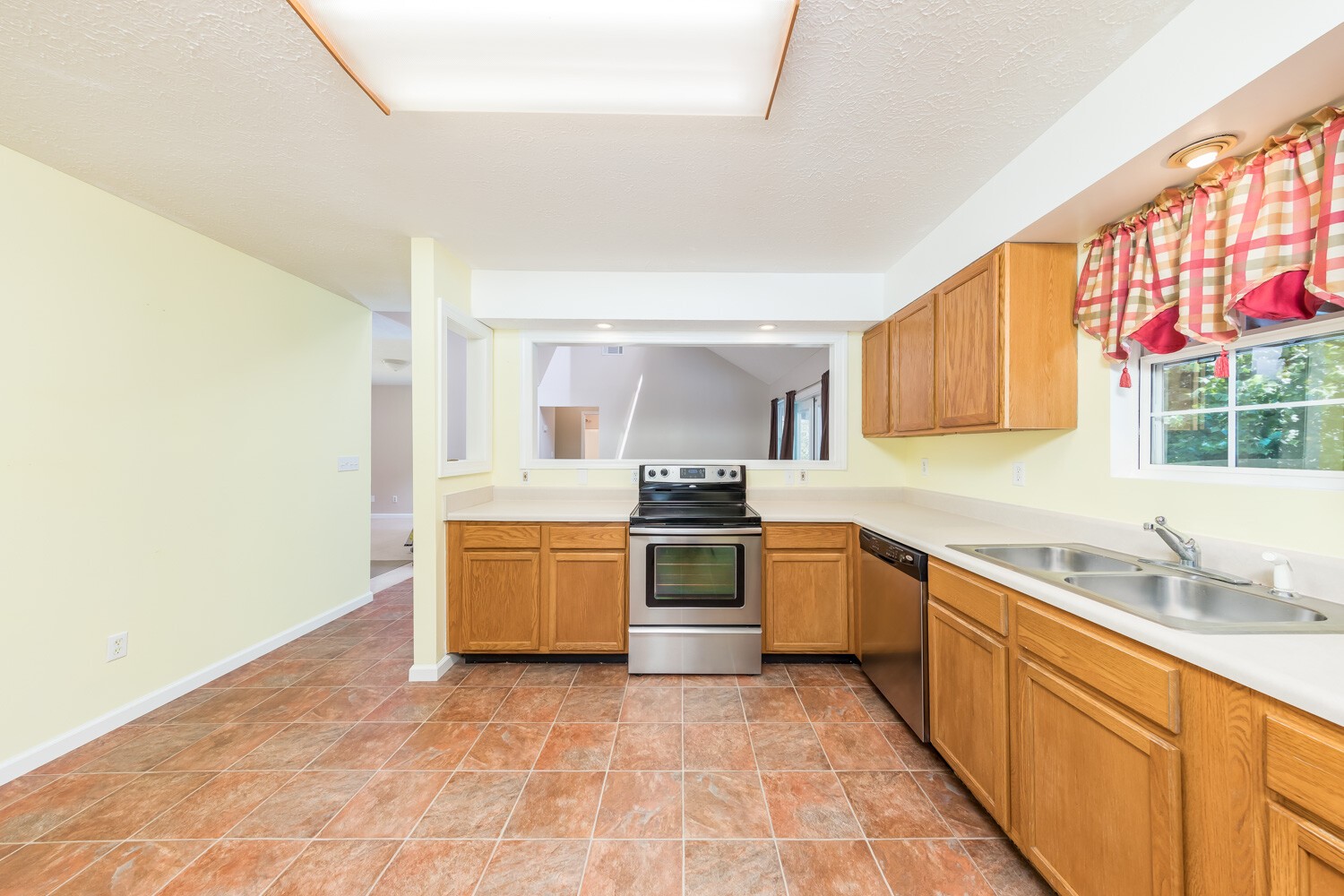 415 French Hill Road Tennessee Ridge, TN 37178 - Photo 15 of 48 a large kitchen with a stove top oven sink and cabinets