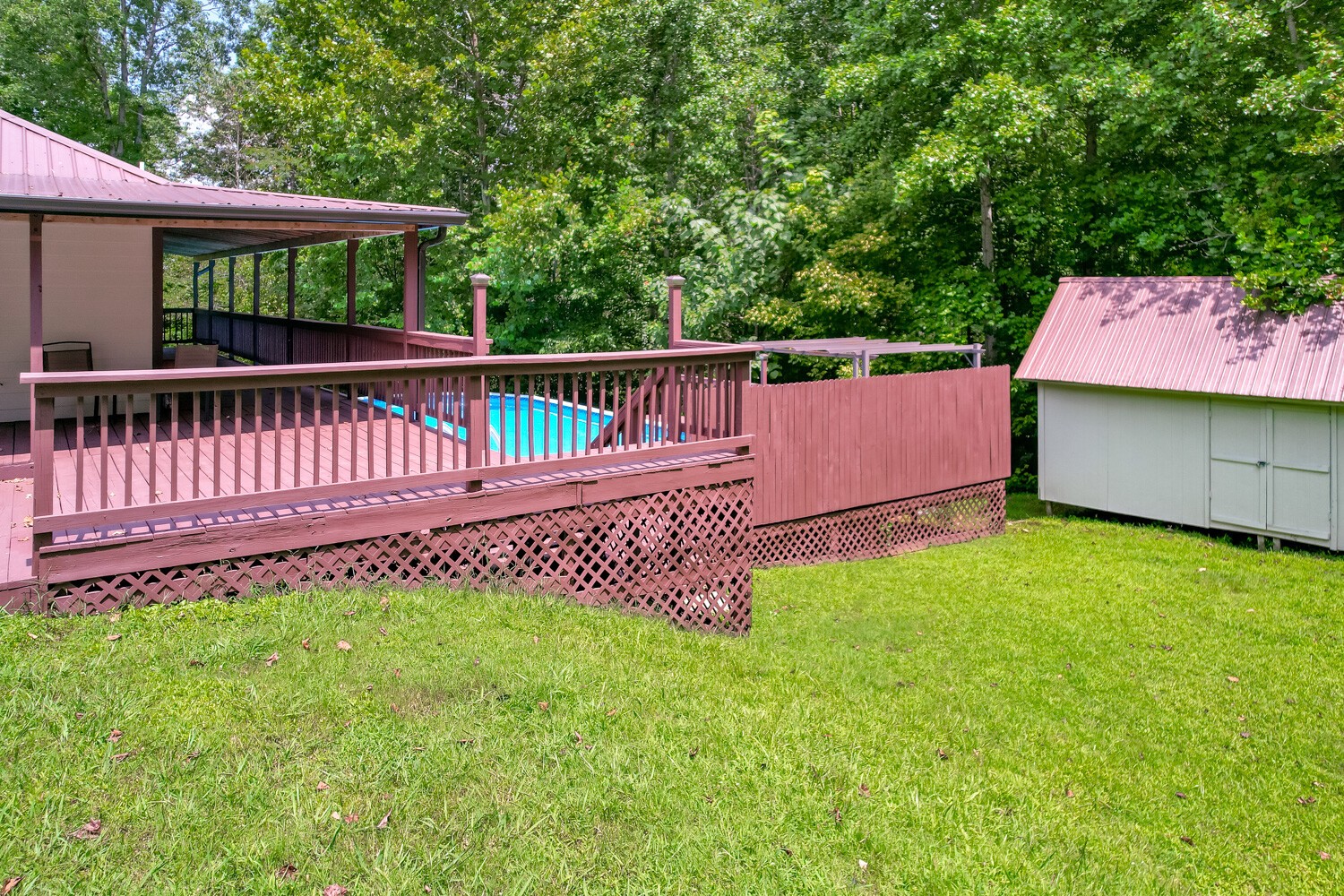 415 French Hill Road Tennessee Ridge, TN 37178 - Photo 3 of 48 a view of a deck with a fence