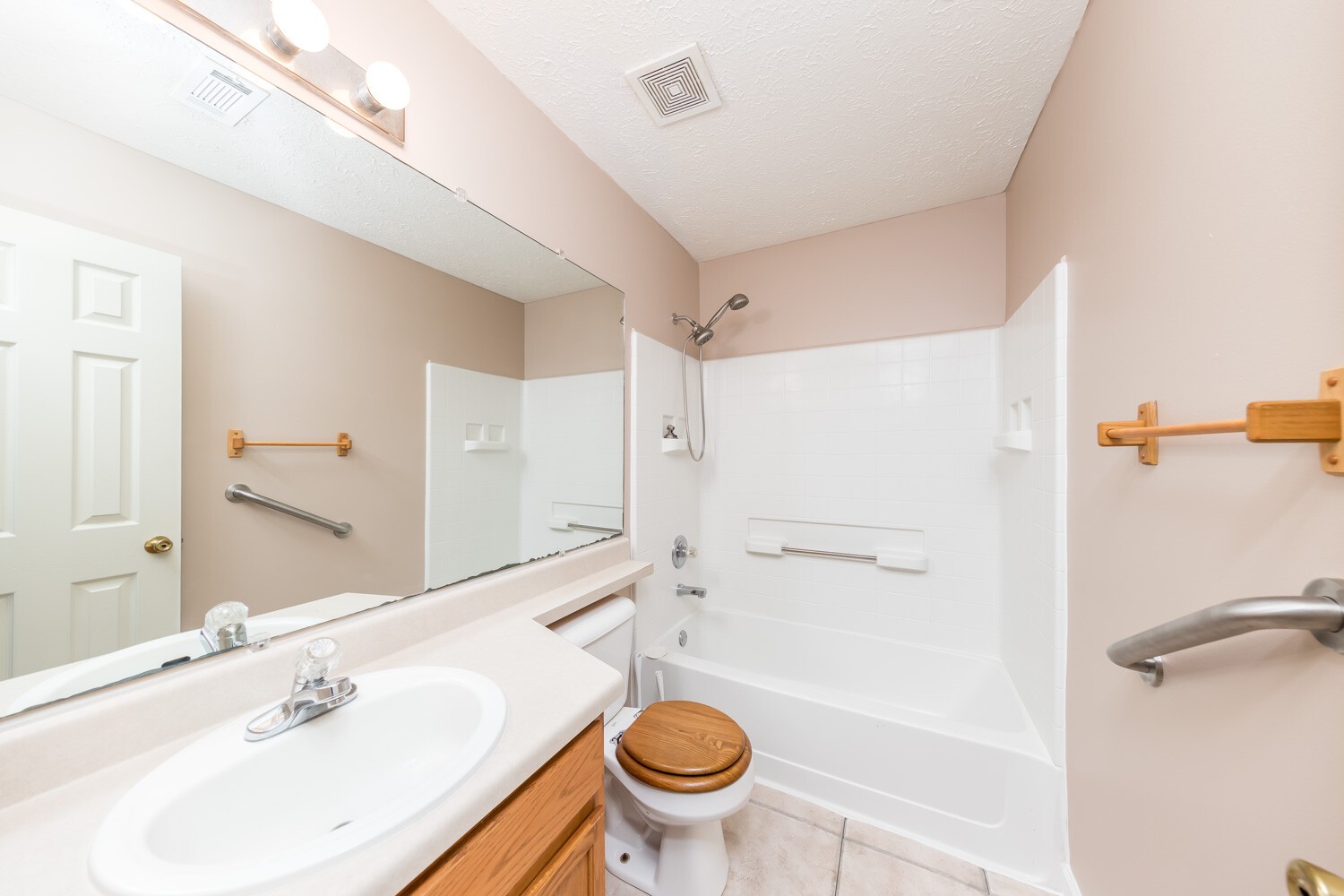 415 French Hill Road Tennessee Ridge, TN 37178 - Photo 22 of 48 a bathroom with a sink a toilet and a mirror
