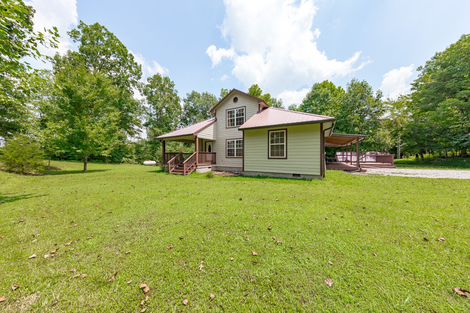 415 French Hill Road Tennessee Ridge, TN 37178 - Photo 42 of 48 a view of a house with a yard