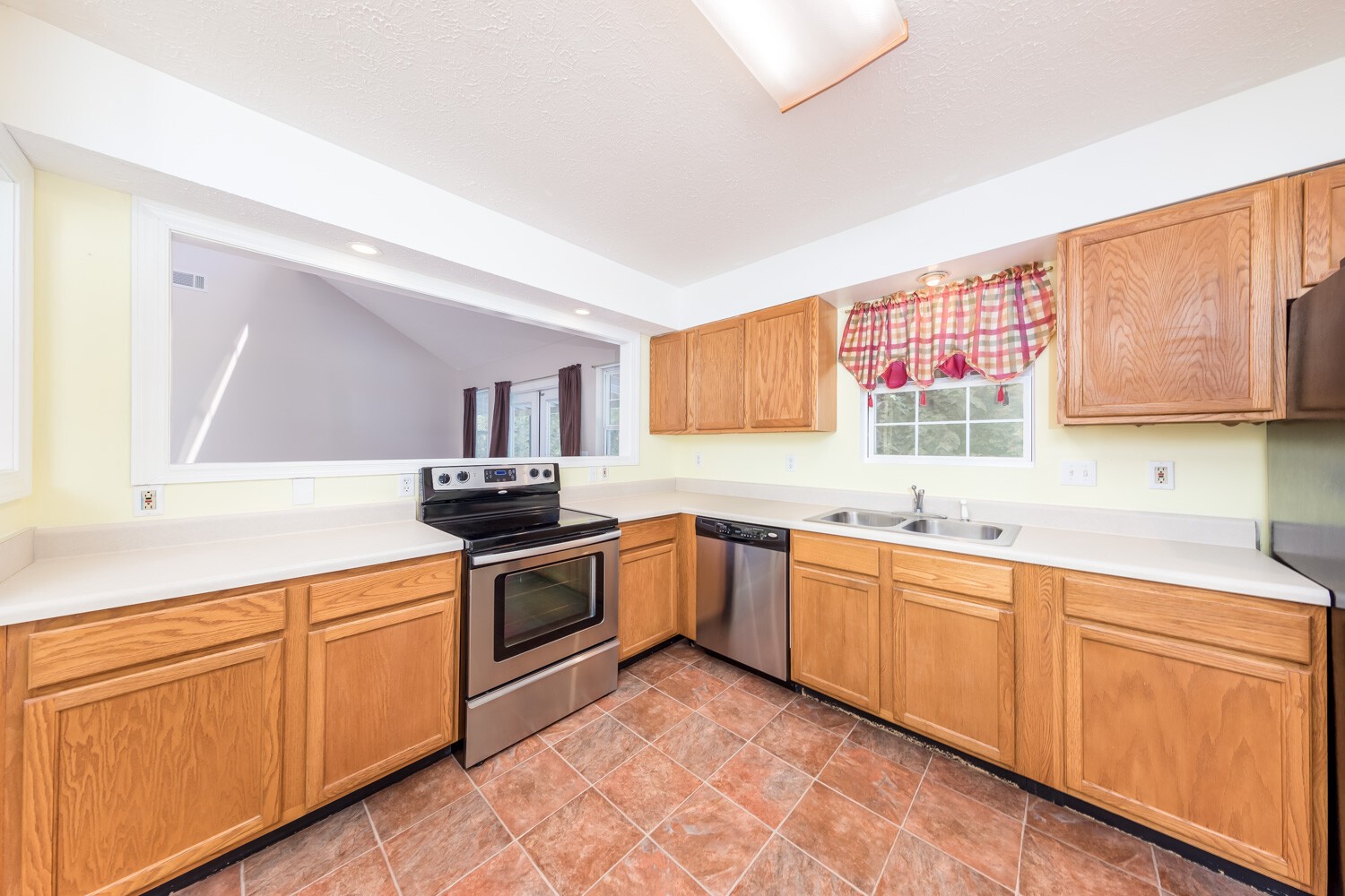 415 French Hill Road Tennessee Ridge, TN 37178 - Photo 10 of 48 a kitchen with granite countertop a sink stainless steel appliances and cabinets