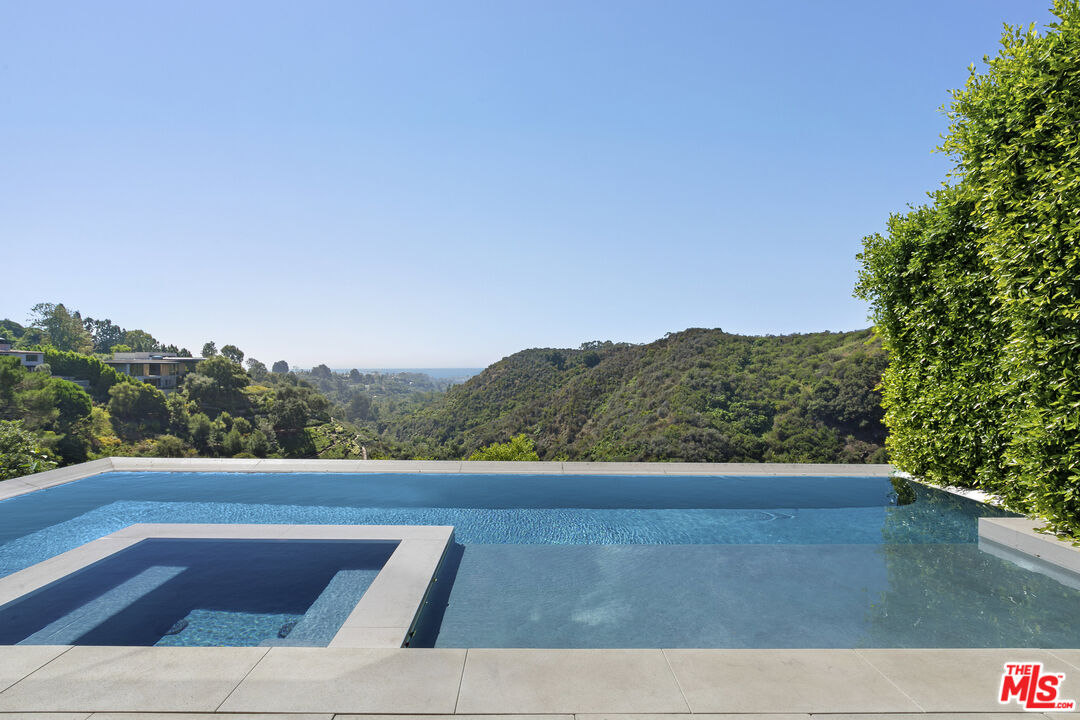 1550 Casale Road Pacific Palisades, CA 90272 - Photo 27 of 29 a view of a yard with an outdoor seating