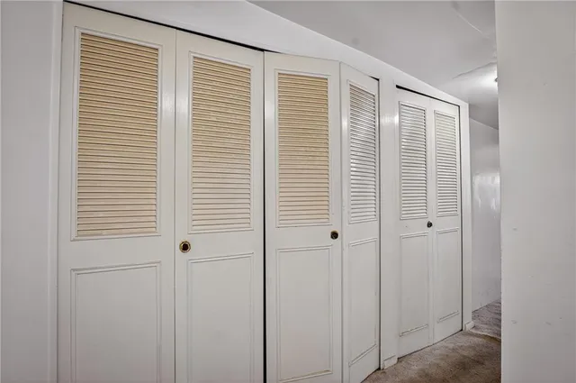 a view of a room that has a window in it