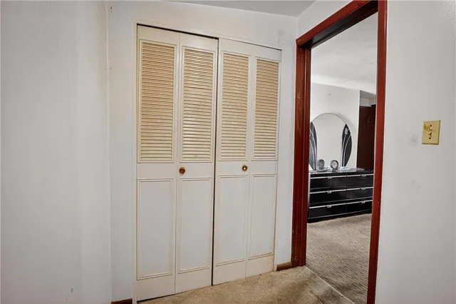 a view of a bedroom with closet