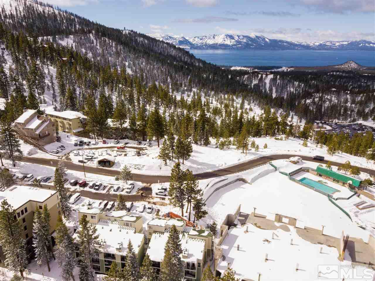 331 Tramway Drive, Unit 4 Stateline, NV 89449 - Photo 2 of 18 a view of swimming pool and mountain