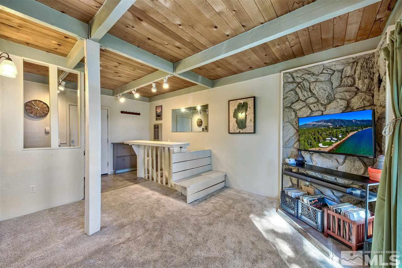 331 Tramway Drive, Unit 4 Stateline, NV 89449 - Photo 6 of 18 a view of a hallway with seating space
