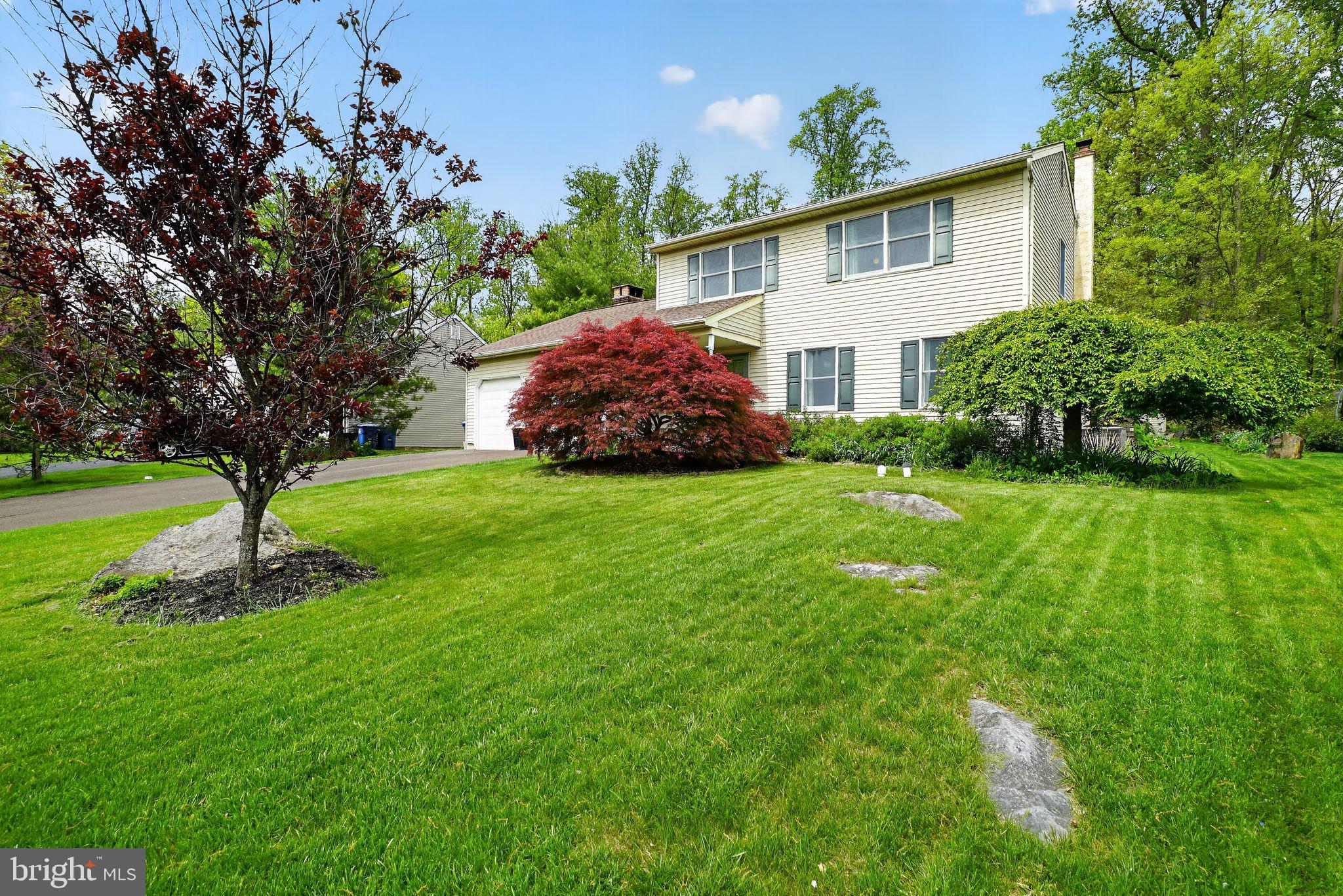 32 Ridge Run Road Sellersville, PA 18960 - Photo 2 of 30 Charming home with lush greenery.