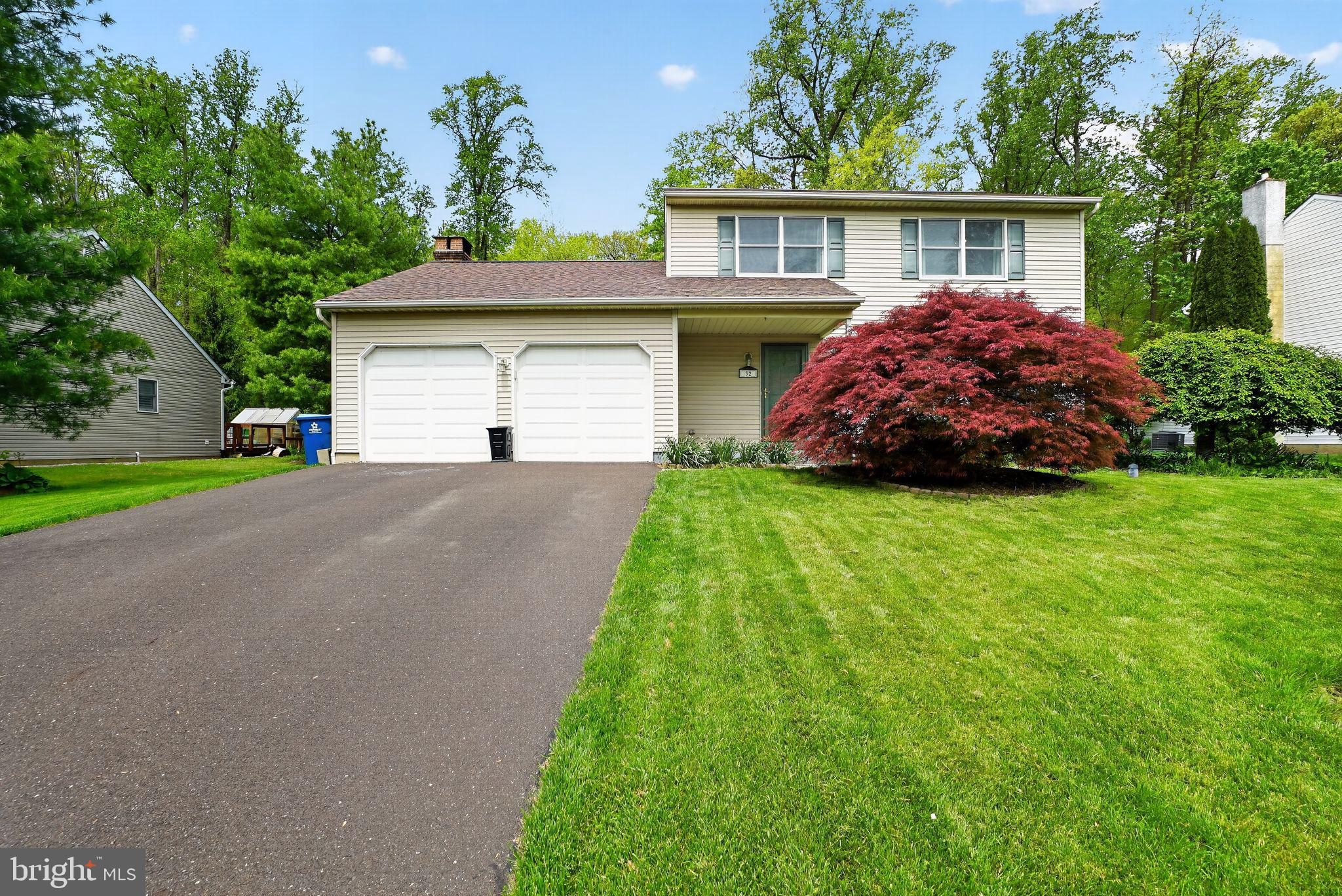 32 Ridge Run Road Sellersville, PA 18960 - Photo 3 of 30 Charming home with lush greenery.