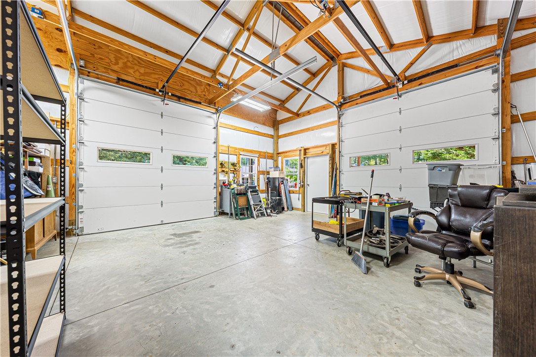 285 Bertha Allen Road Westminster, SC 29693 - Photo 49 of 50 Vast garage space with high vaulted ceilings and ample room for vehicles and projects.