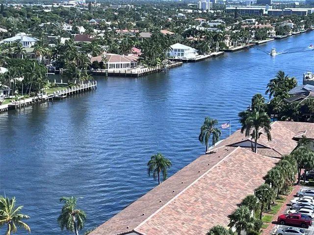 a view of a lake with a building in the background