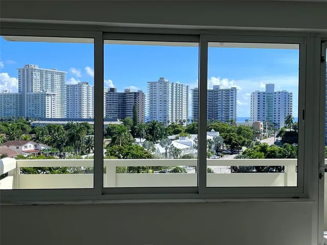 a view of a city from a living room