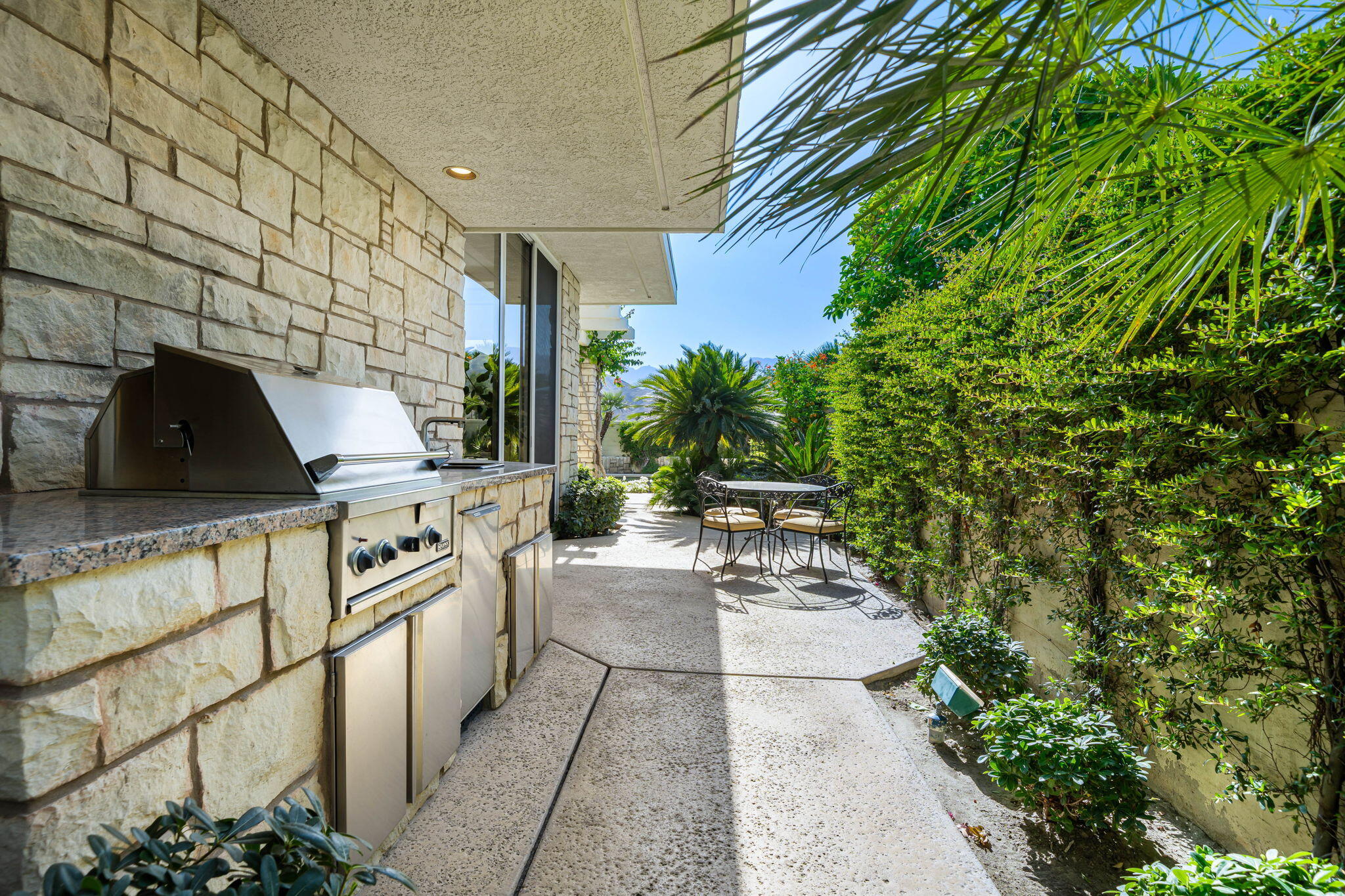 74 Mayfair Drive Rancho Mirage, CA 92270 - Photo 27 of 64 Shaded side yard with gas BBQ