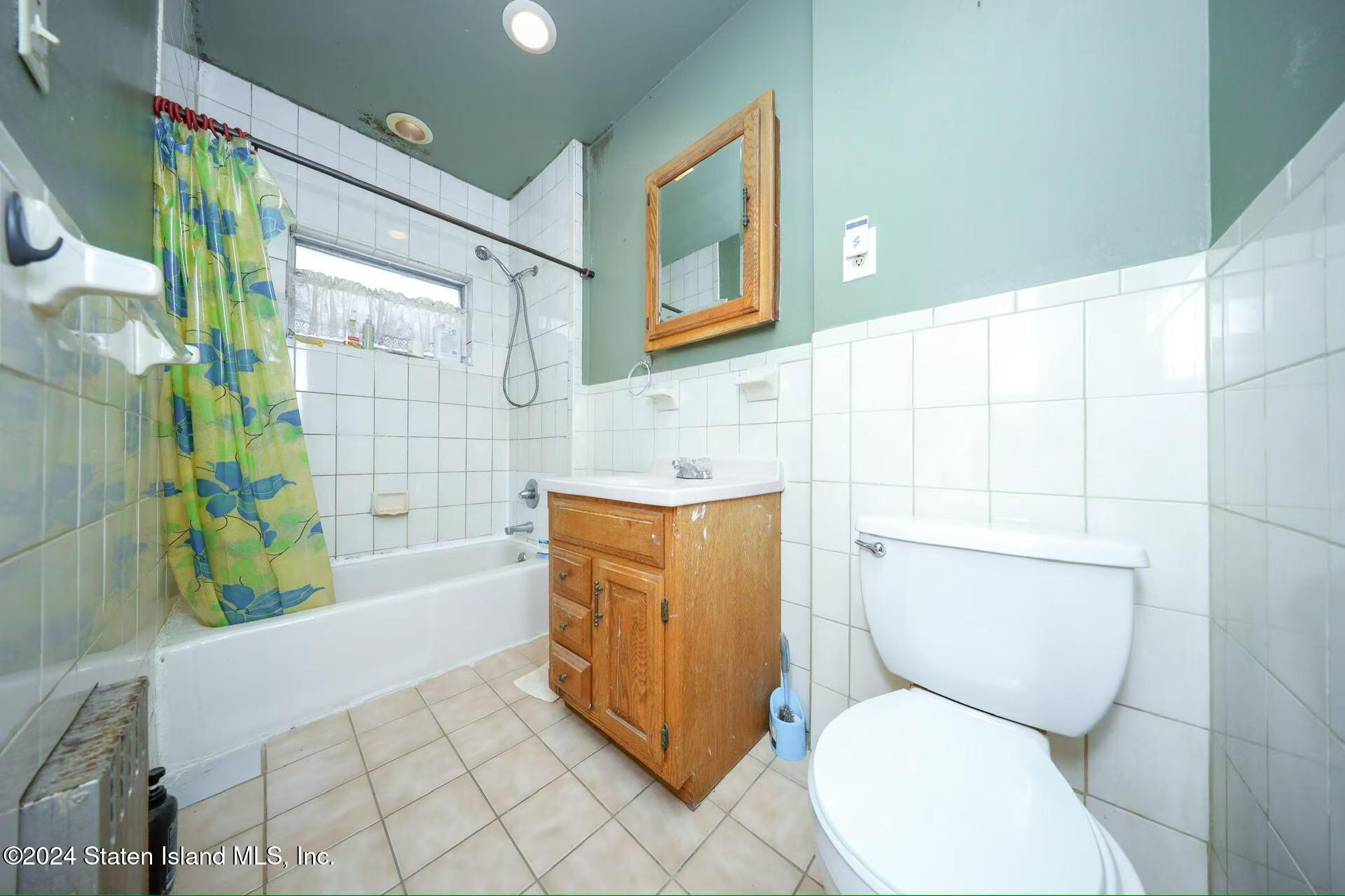 91-29 79th Street Queens, NY 11421 - Photo 10 of 19 a928fec9c9815657ec6bc59273ca41fb