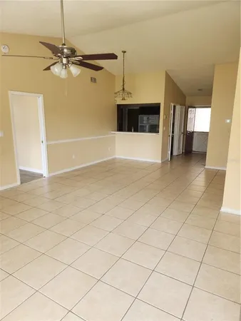 a view of a livingroom with a staircase