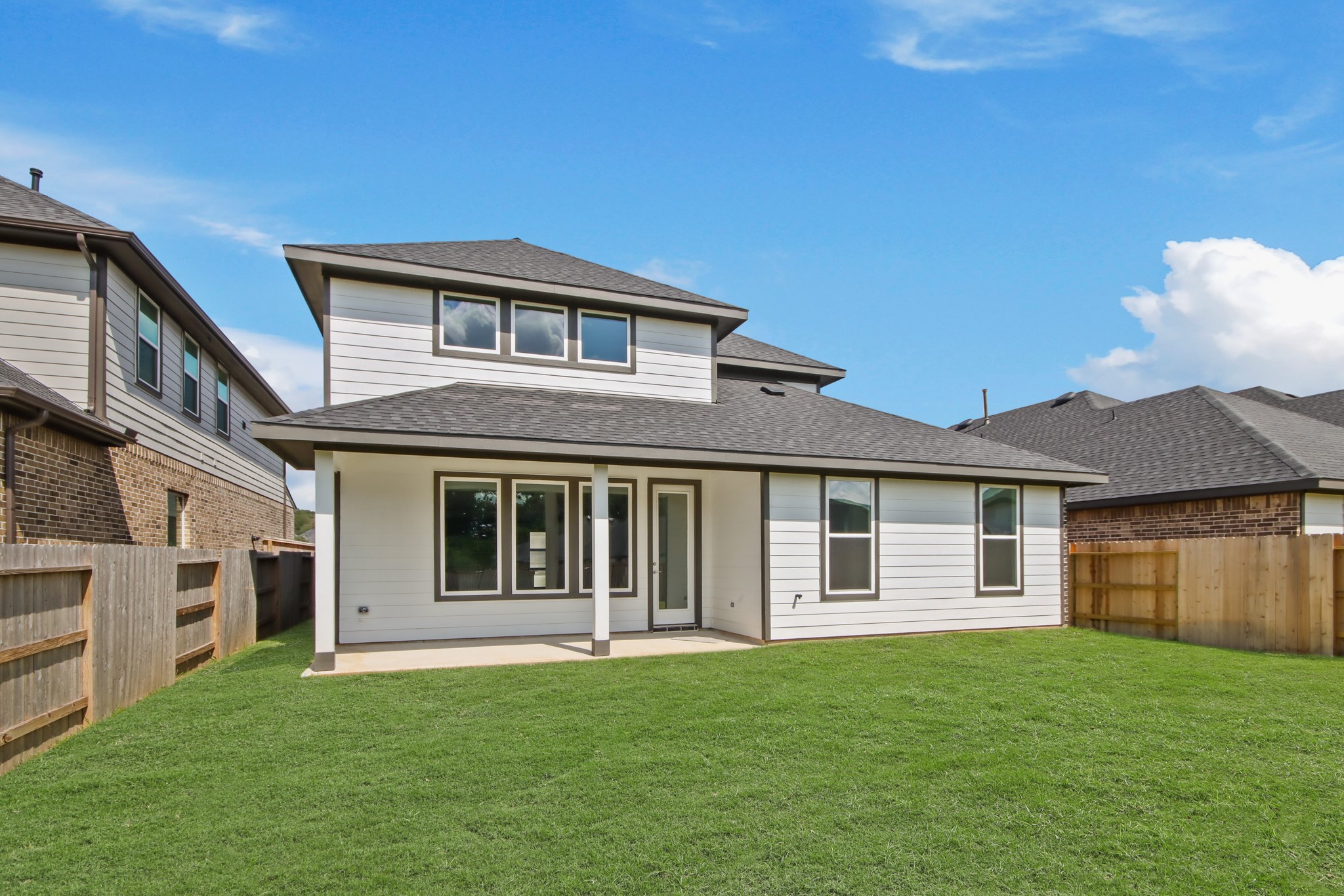 259 Springfield Terrace Drive Conroe, TX 77304 - Photo 5 of 14 a front view of a house with a garden