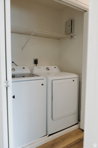 215 South 1050th West, Unit 10 Provo, UT 84601 - Photo 16 of 38 Laundry area with washing machine and dryer and light wood finished floors