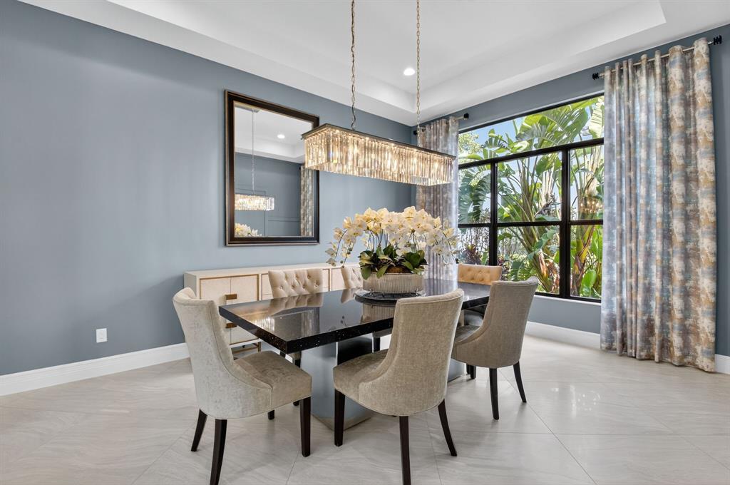 9294 Biaggio Road Boca Raton, FL 33496 - Photo 14 of 80 a view of a dining room with furniture window and outside view