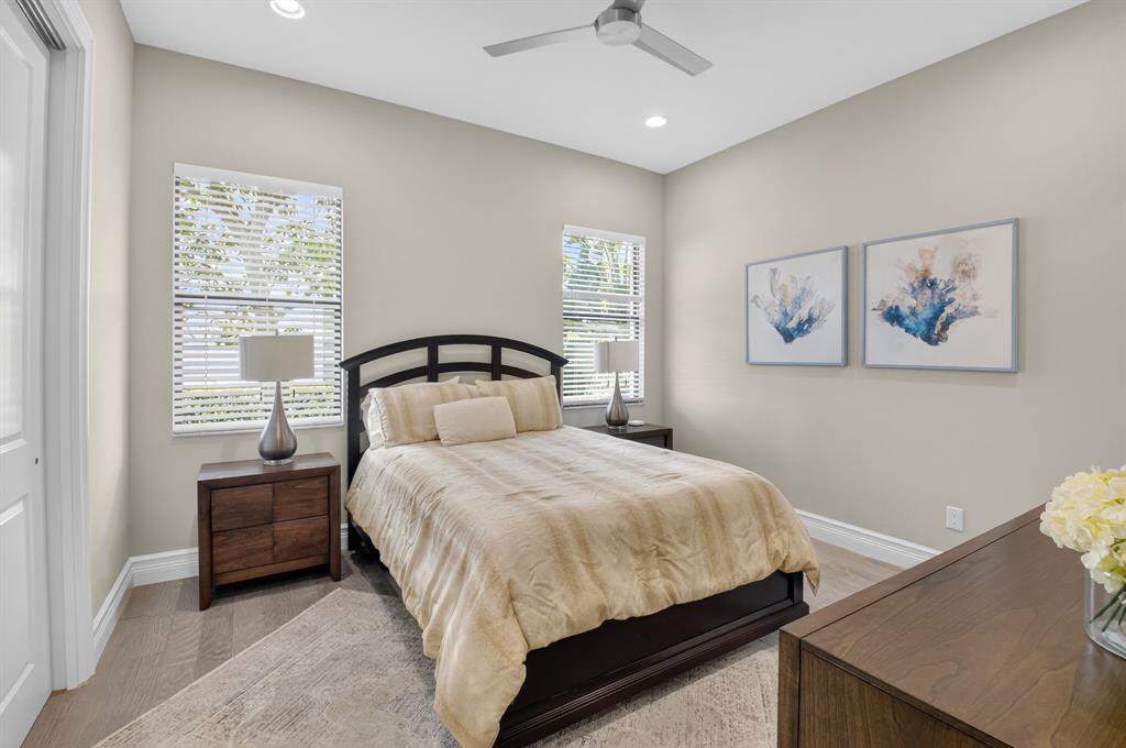 9294 Biaggio Road Boca Raton, FL 33496 - Photo 30 of 80 a bedroom with a bed and window