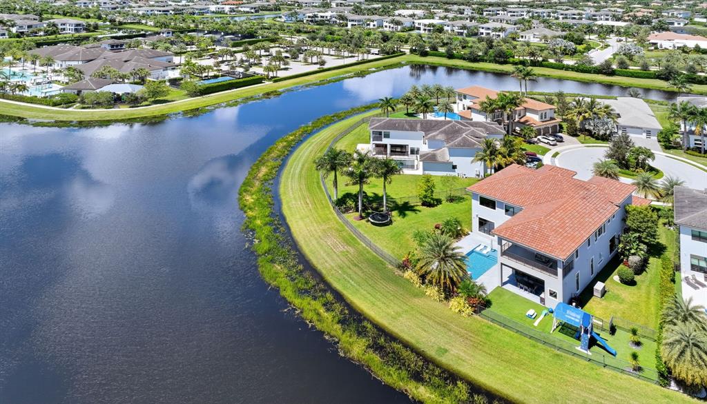 9294 Biaggio Road Boca Raton, FL 33496 - Photo 4 of 80 an aerial view of a house with a lake view