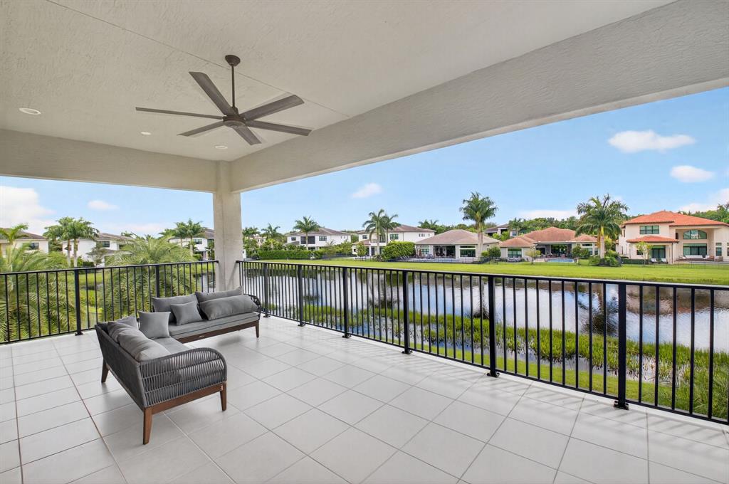 9294 Biaggio Road Boca Raton, FL 33496 - Photo 45 of 80 a balcony with furniture