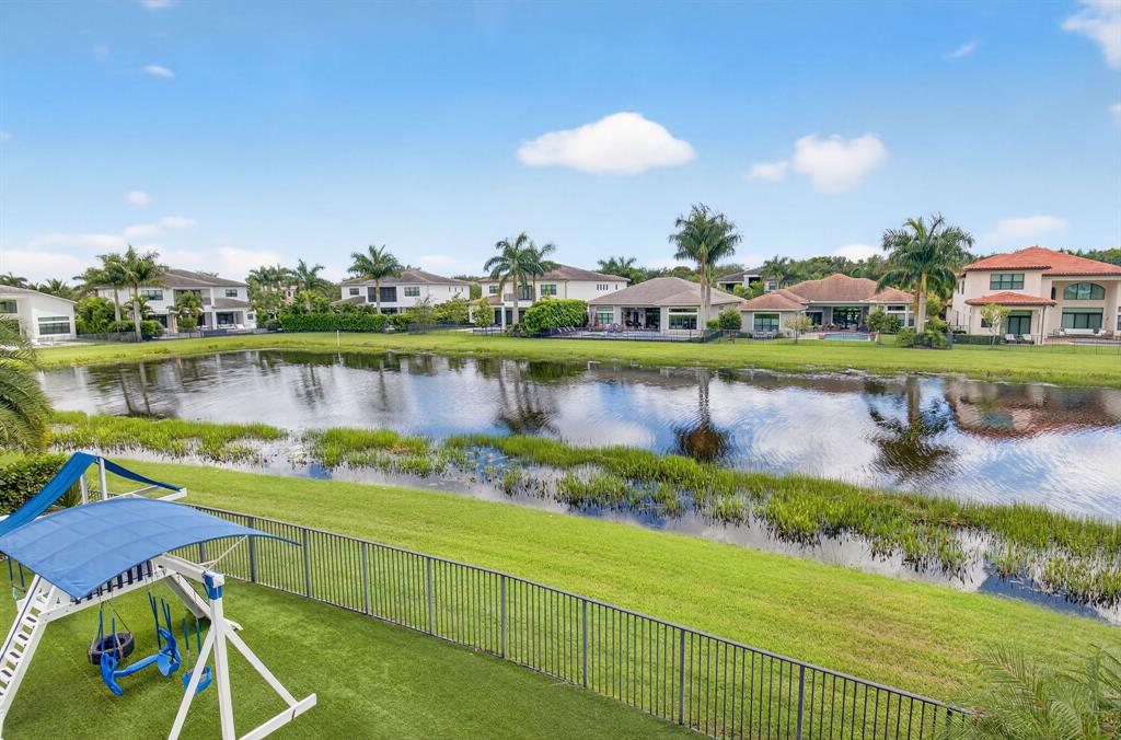 9294 Biaggio Road Boca Raton, FL 33496 - Photo 46 of 80 an aerial view of a house with swimming pool outdoor seating and yard