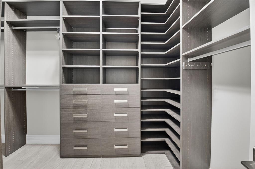 9294 Biaggio Road Boca Raton, FL 33496 - Photo 50 of 80 a view of walk in closet with empty racks