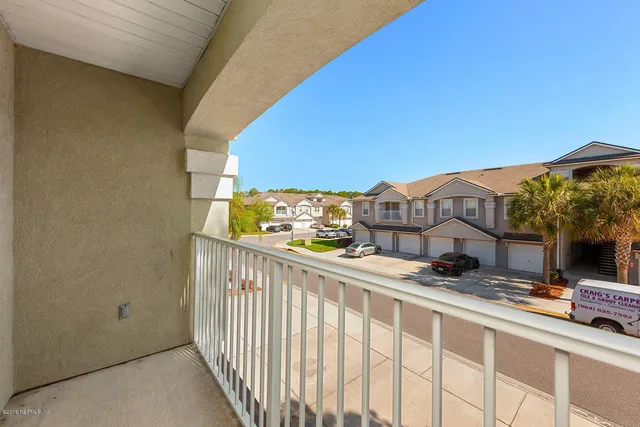 a view of a swimming pool with a lake view