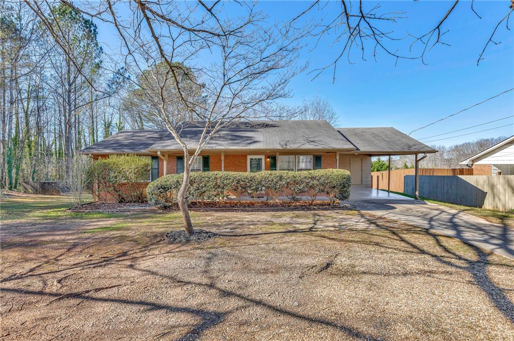 a house with trees in front of it