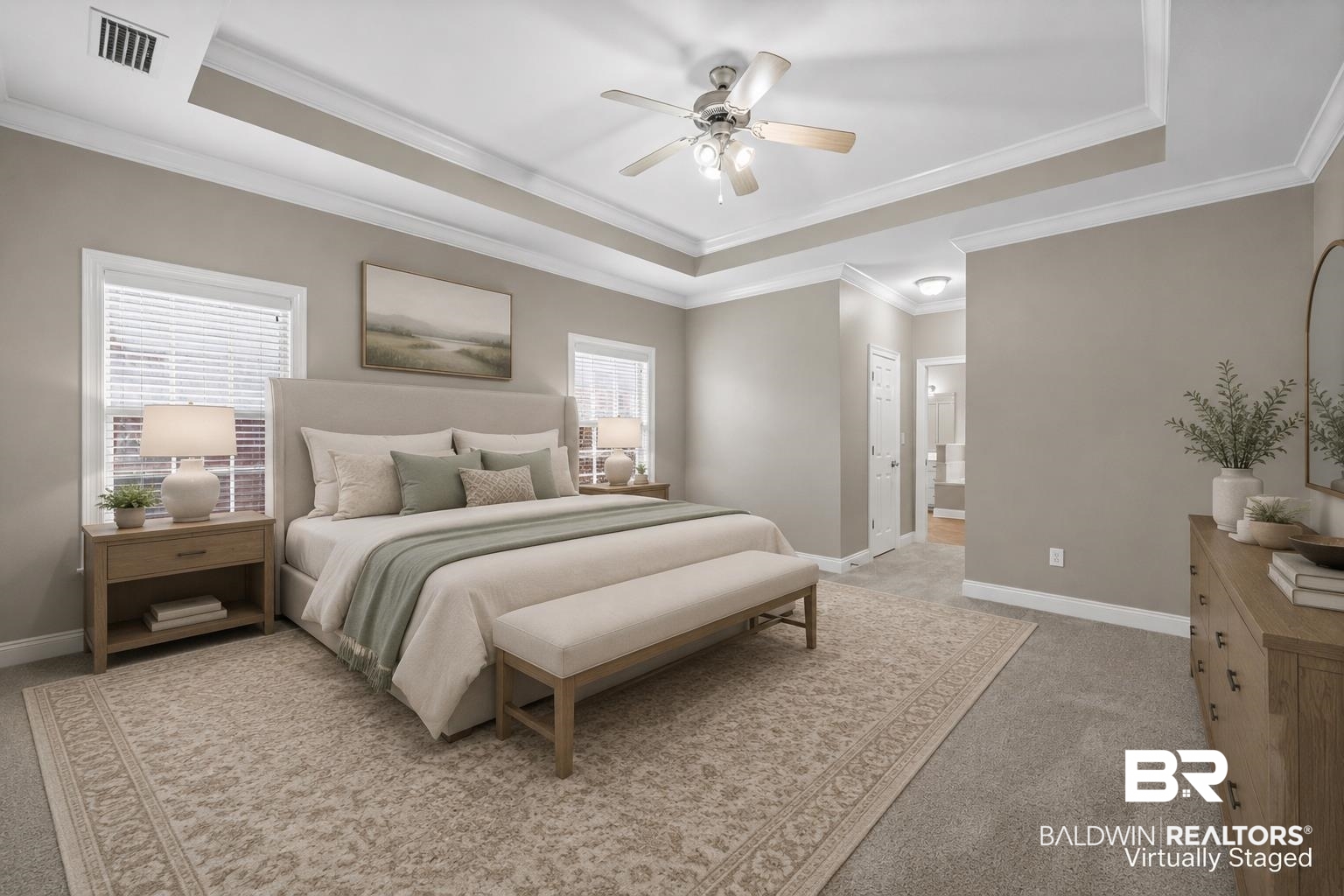 303 Savannah Circle Foley, AL 36535 - Photo 34 of 34 Spacious bedroom featuring a tray ceiling with crown molding, carpeted flooring, and twin windows with blinds