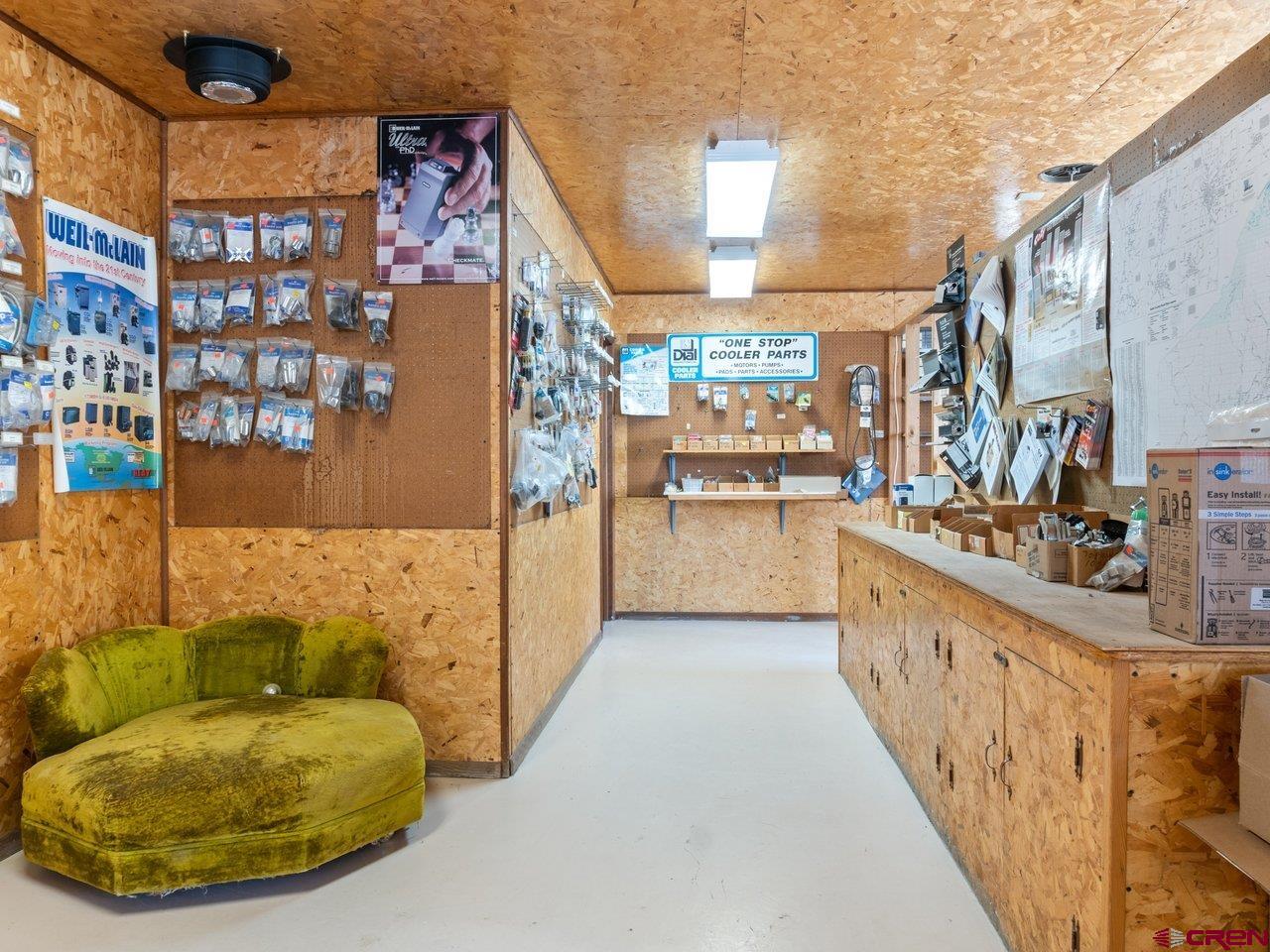 477 1600 Road Delta, CO 81416 - Photo 18 of 23 a view of a kitchen with shelves