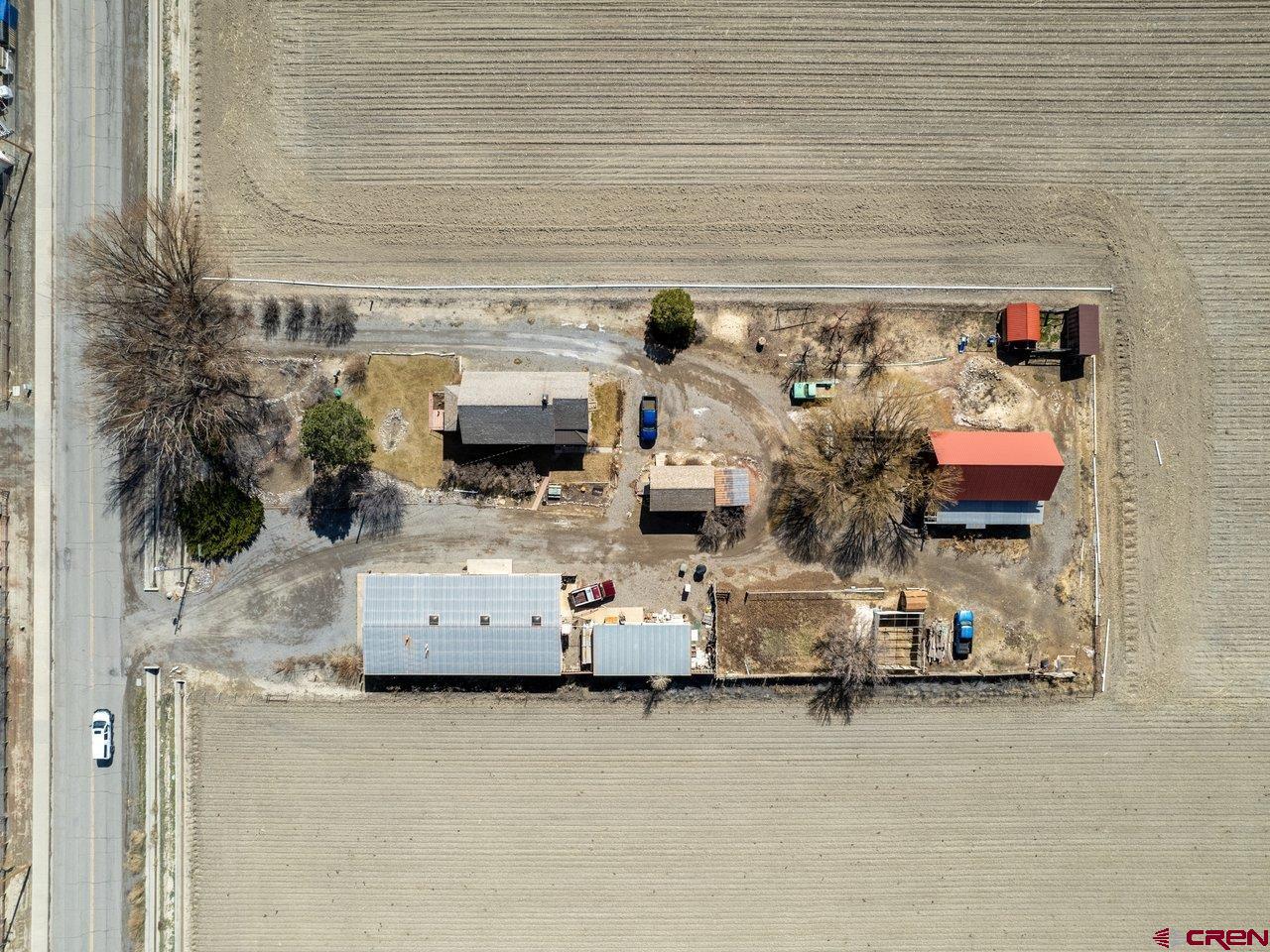 477 1600 Road Delta, CO 81416 - Photo 21 of 23 a view of living room with furniture and flat screen tv