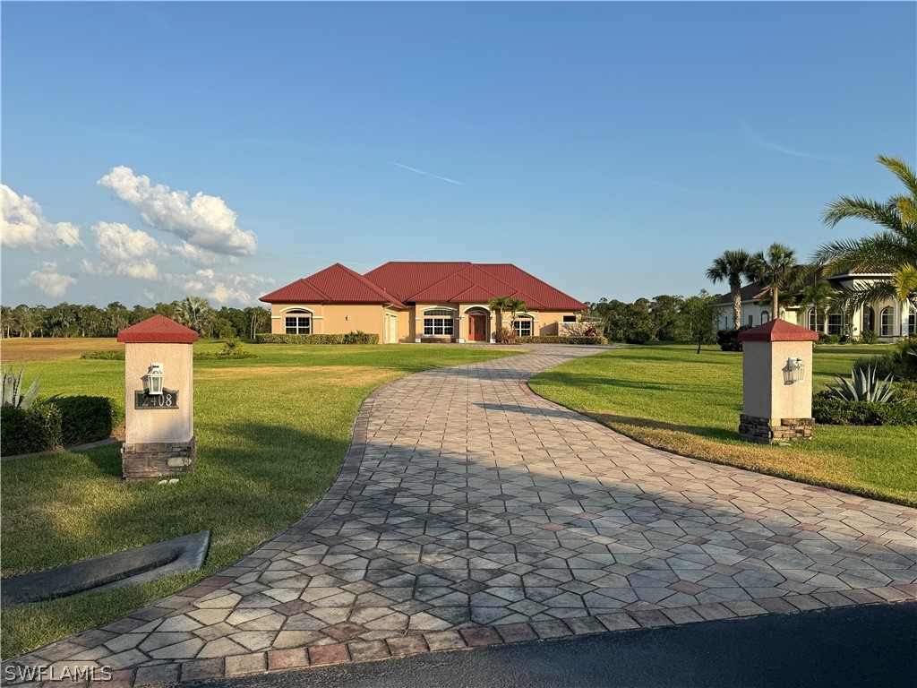 2408 River Way LaBelle, FL 33935 - Photo 1 of 21 a view of an outdoor space and swimming pool