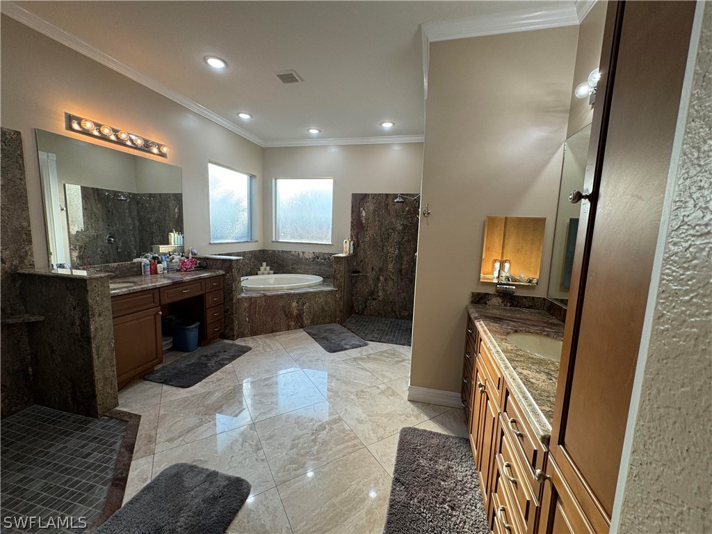 2408 River Way LaBelle, FL 33935 - Photo 16 of 21 a kitchen with a sink stainless steel appliances cabinets and a counter top space