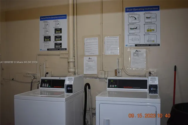 a utility room with dryer and washer