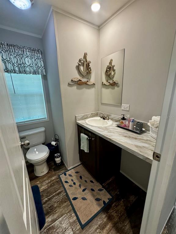 14365 Northeast 252nd Ct Road, Unit 123 Salt Springs, FL 32134 - Photo 11 of 44 a bathroom with a sink and a mirror