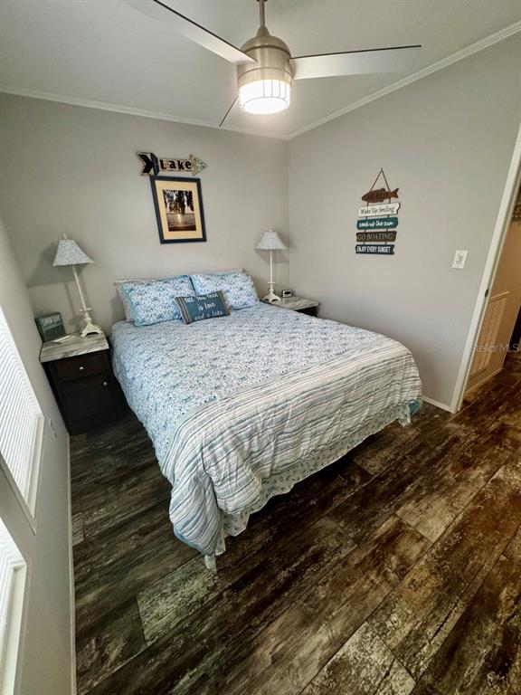 14365 Northeast 252nd Ct Road, Unit 123 Salt Springs, FL 32134 - Photo 17 of 44 a bedroom with a bed and a window