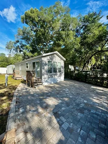 a view of house with a outdoor space