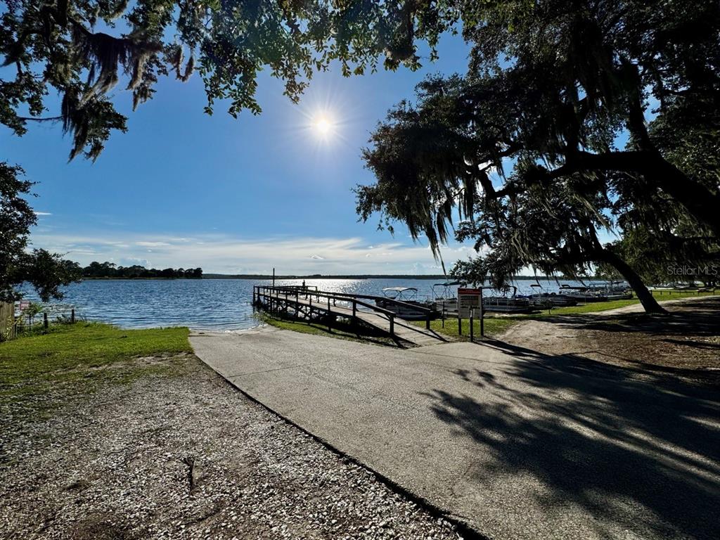 14365 Northeast 252nd Ct Road, Unit 123 Salt Springs, FL 32134 - Photo 31 of 44 a view of a yard with an outdoor space