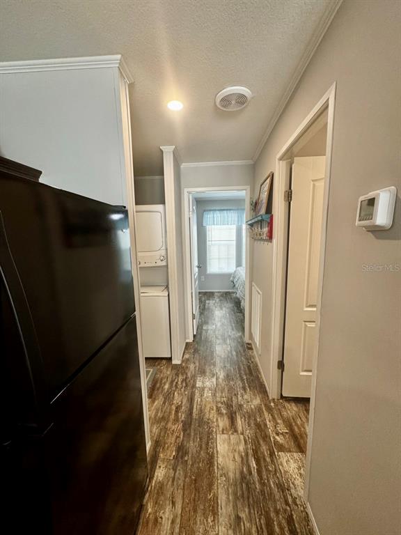 14365 Northeast 252nd Ct Road, Unit 123 Salt Springs, FL 32134 - Photo 9 of 44 a view of hallway with wooden floor