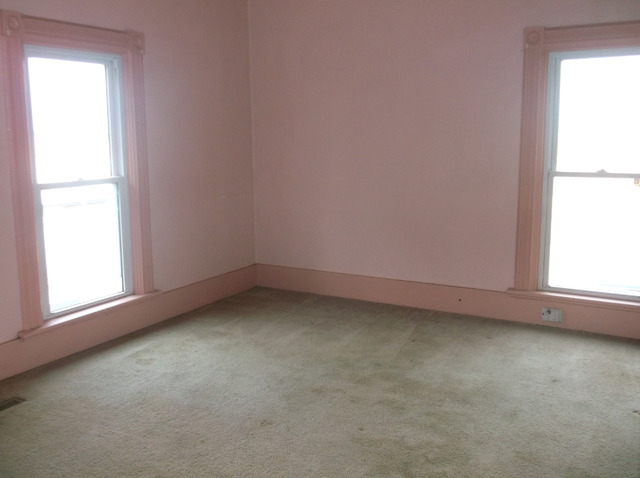 413 North 1851st Road Tonica, IL 61370 - Photo 7 of 12 an empty room with a window