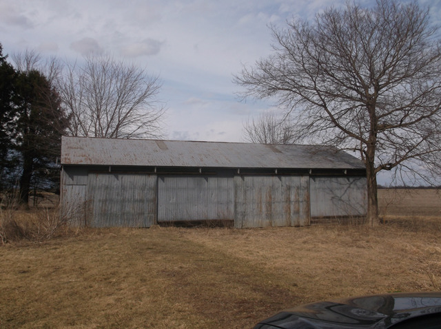 413 North 1851st Road Tonica, IL 61370 - Photo 10 of 12 a front view of a house with a yard