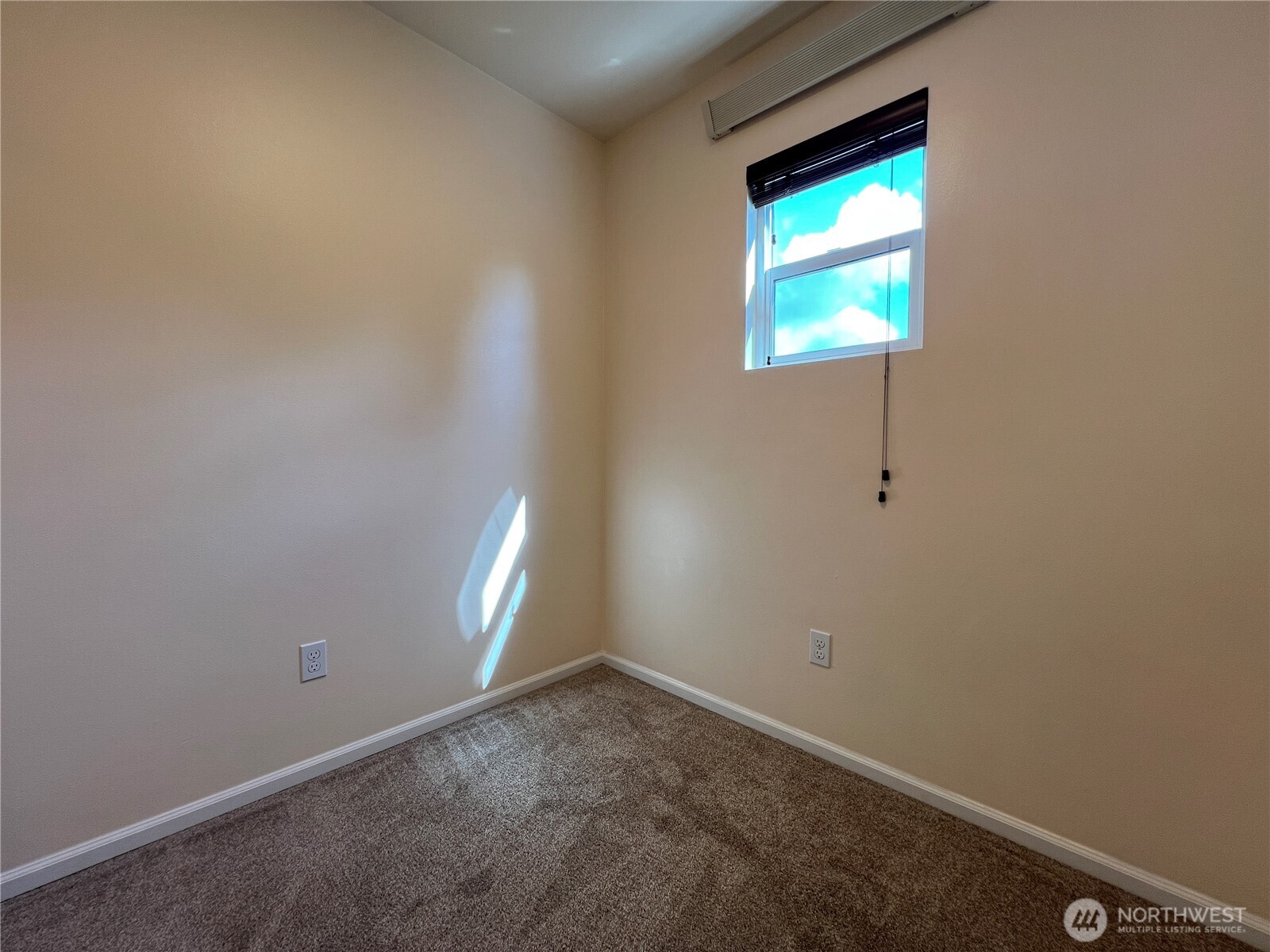 5447 57th Loop Southeast Lacey, WA 98503 - Photo 26 of 31 a view of an empty room with a window