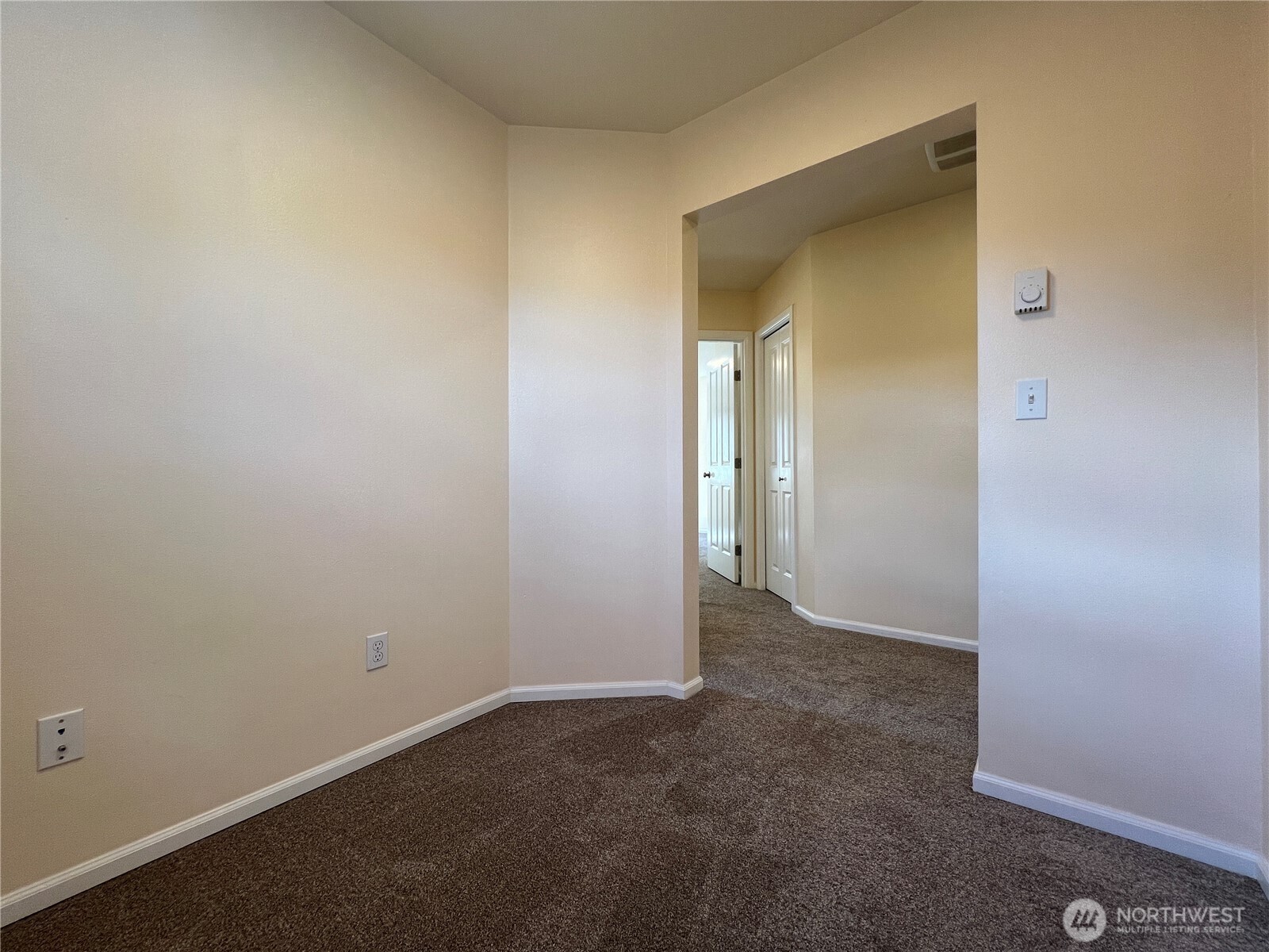 5447 57th Loop Southeast Lacey, WA 98503 - Photo 27 of 31 an empty room with mirror