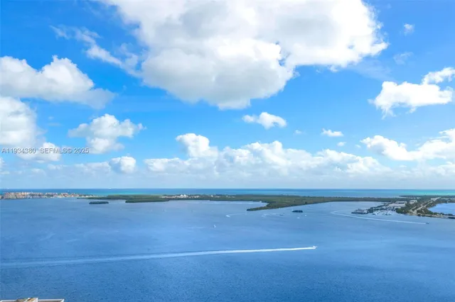 a view of swimming pool from a balcony