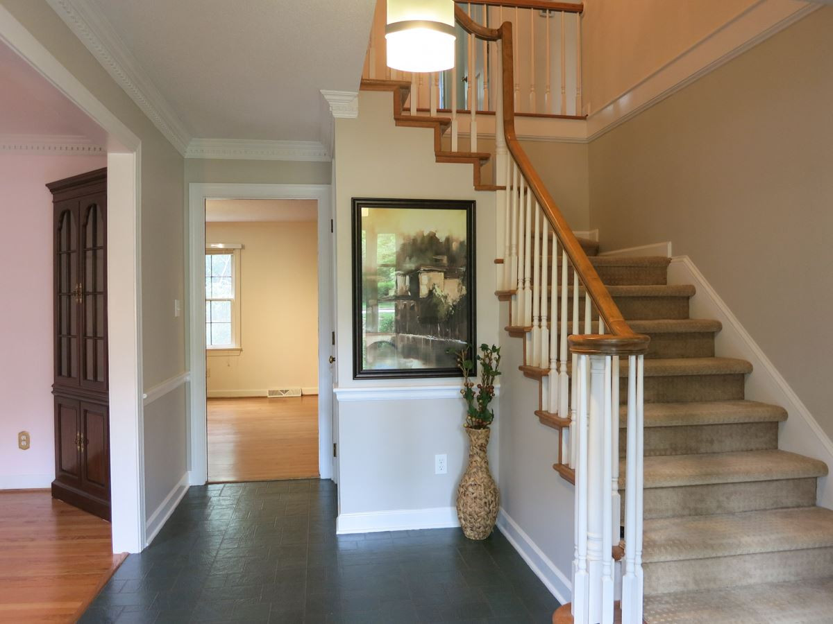 1120 Country Ridge Drive Raleigh, NC 27609 - Photo 3 of 25 Gracious Foyer w/slate-look floor, dentil crown molding & coat closet. Foyer