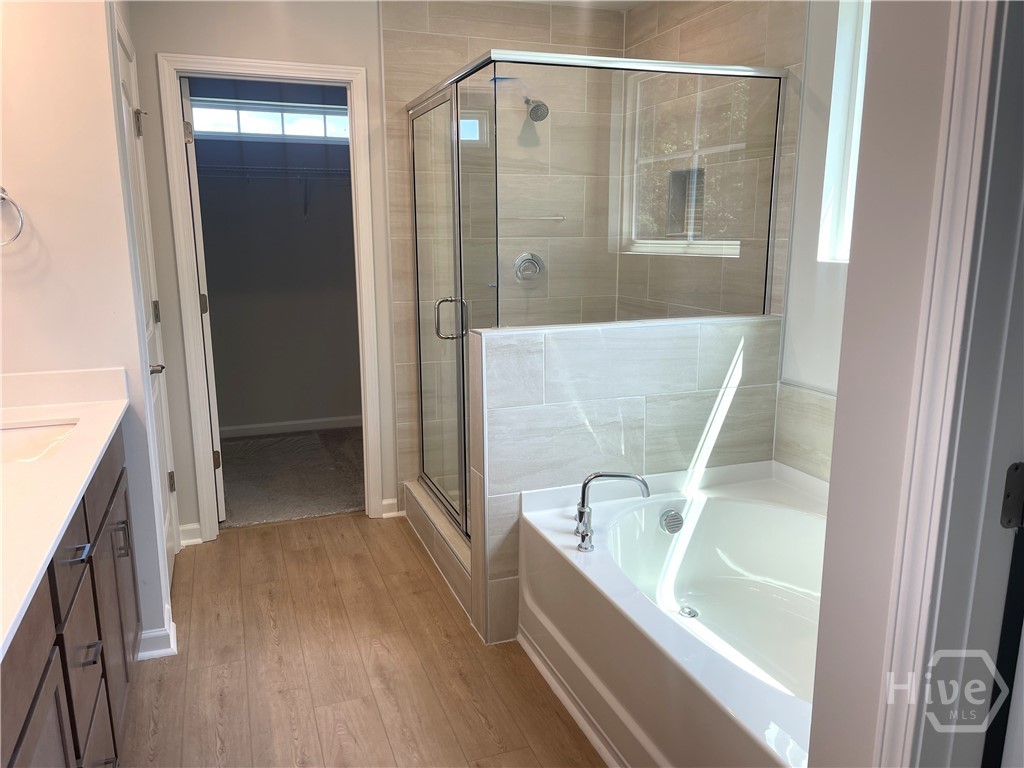 193 Champlain Drive Pooler, GA 31322 - Photo 12 of 19 Separate Tiled Garden Tub and Walk in Shower