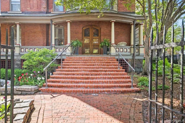 a front view of a house with a porch
