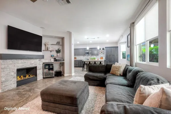 a living room with furniture or fireplace and a flat screen tv